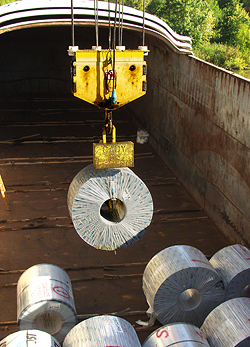 unloading steel coils delivered by barge from Burns Harbor steel mills